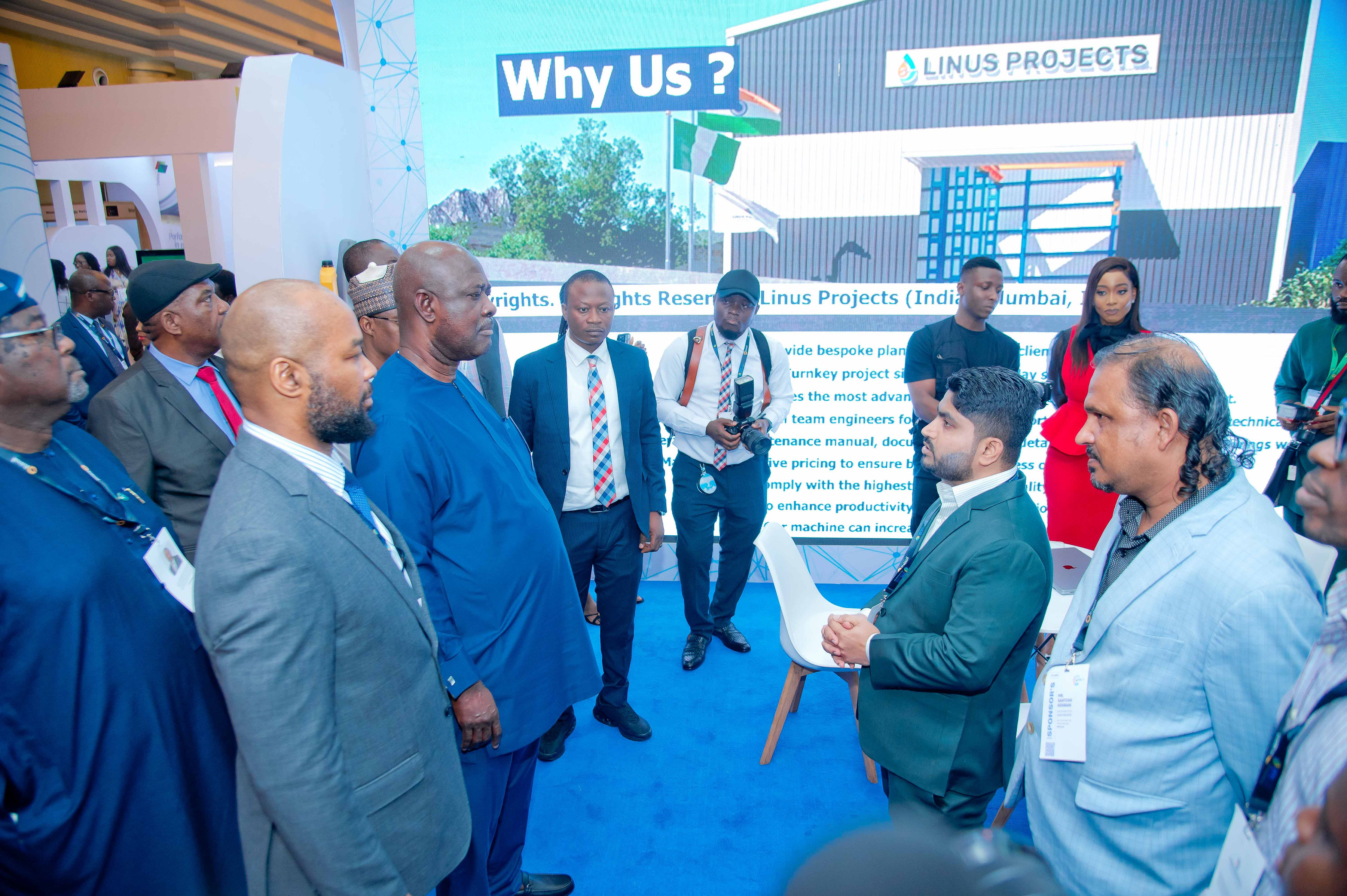 Delegates networking between exhibition stands